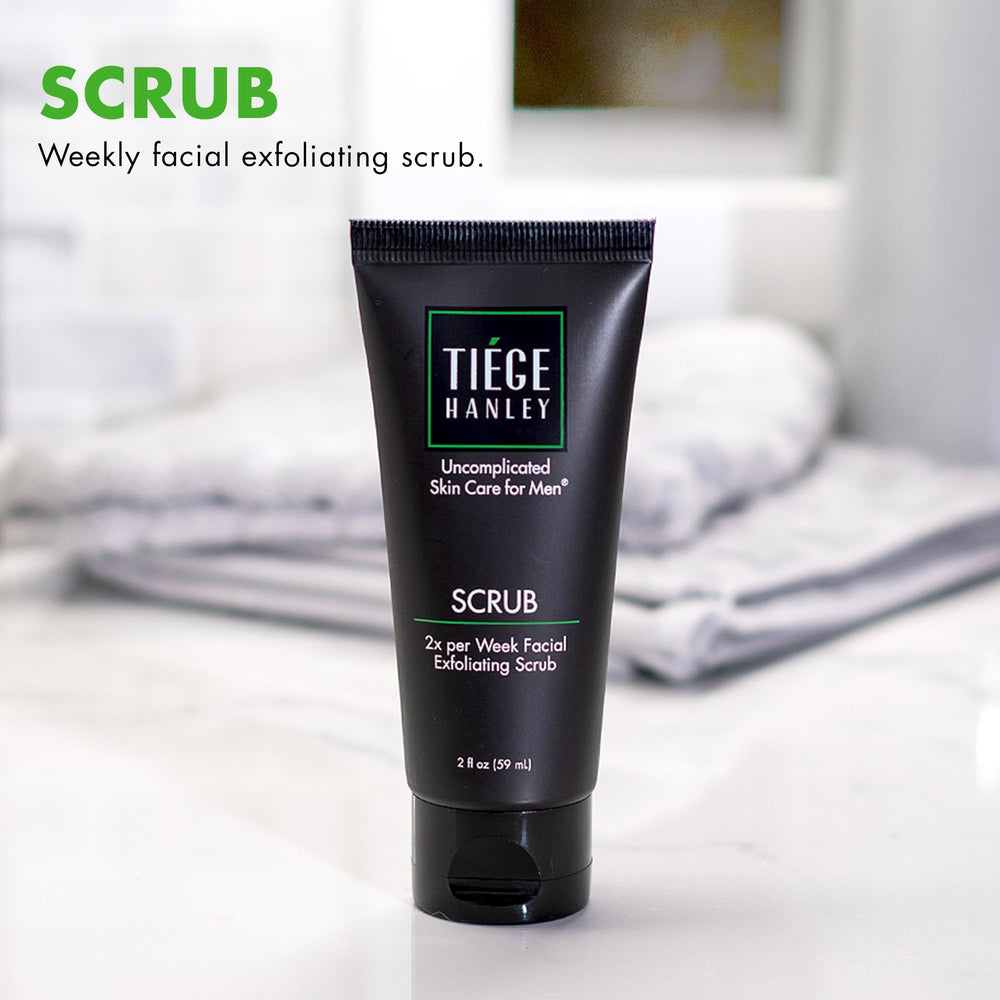 Tiege Hanley exfoliating face wash bottle close-up showing fragrance-free formula.