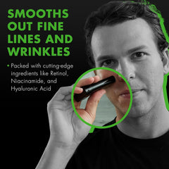 Tiege Hanley Retinol Stick near the eye area suggests refreshing under-eye skin.