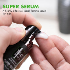 Tiege Hanley serum texture on fingertips demonstrates smooth application.