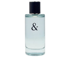 Tiffany & Love for Him bottle pour highlighting a fresh citrus-aromatic scent for daily wear
