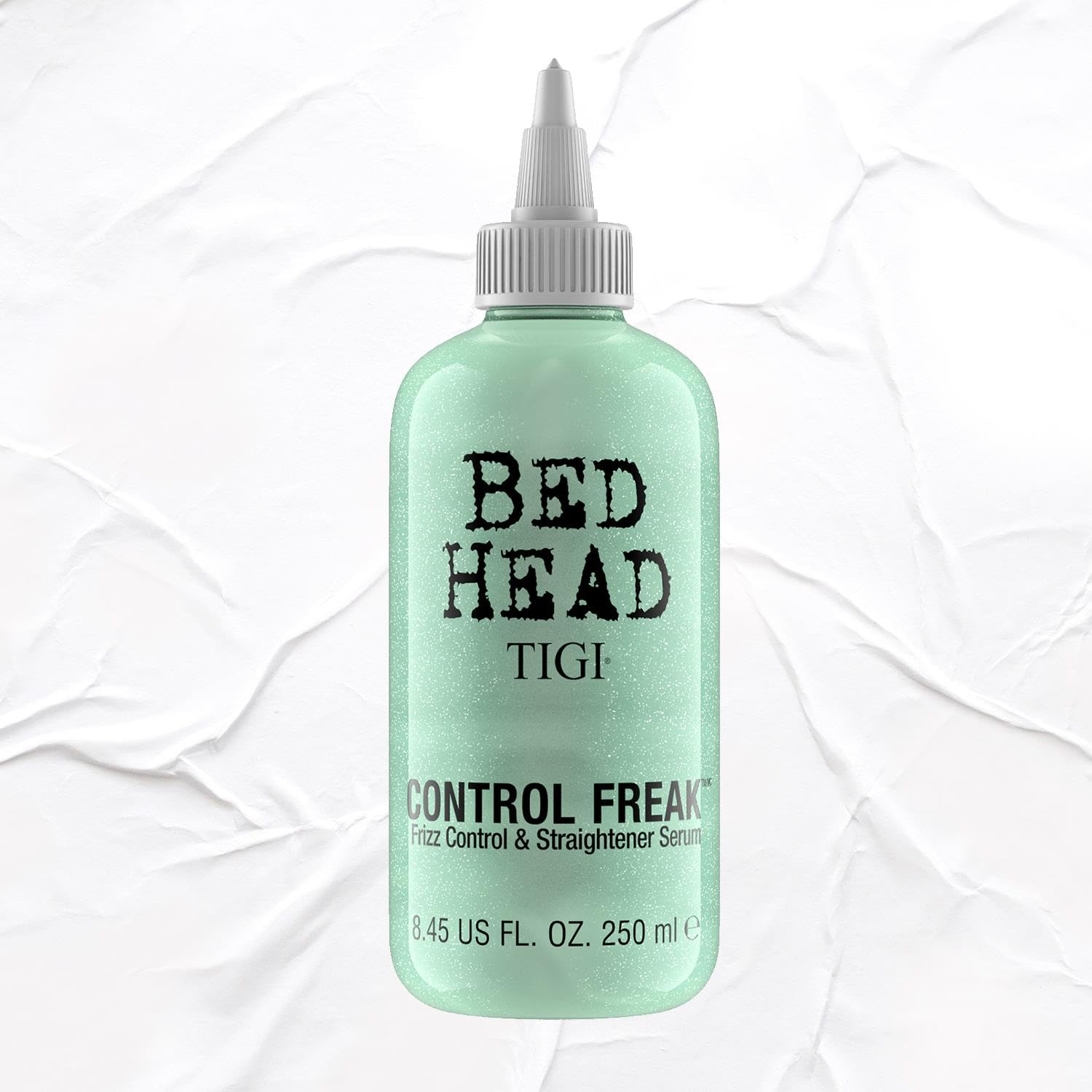 TIGI Bed Head Control Freak applied as finishing touch for humidity resistance.