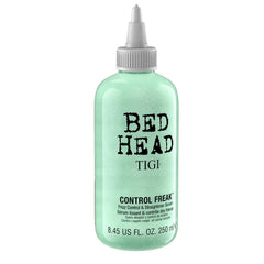 TIGI Bed Head Control Freak serum applied to wet hair smooths curls for definition.