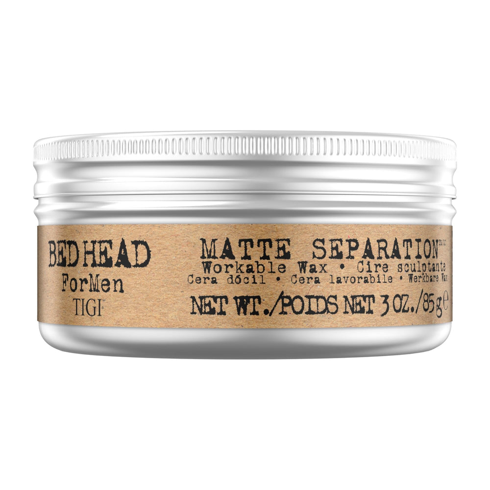 TIGI Bed Head for Men Matte Separation Wax on palms for defined hold.