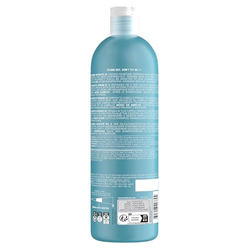 TIGI Bed Head Recovery Conditioner application image showing creamy formula softening damaged strands.