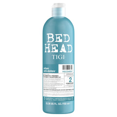 TIGI Bed Head Recovery Conditioner bottle with cap delivering moisture boost for dry hair.