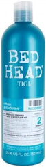 TIGI Bed Head Urban Anti+dotes Recovery Shampoo bottle pour for hydration and shine.