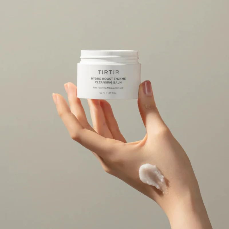 TIRTIR Hydro Boost balm being massaged onto dry face for gentle cleansing