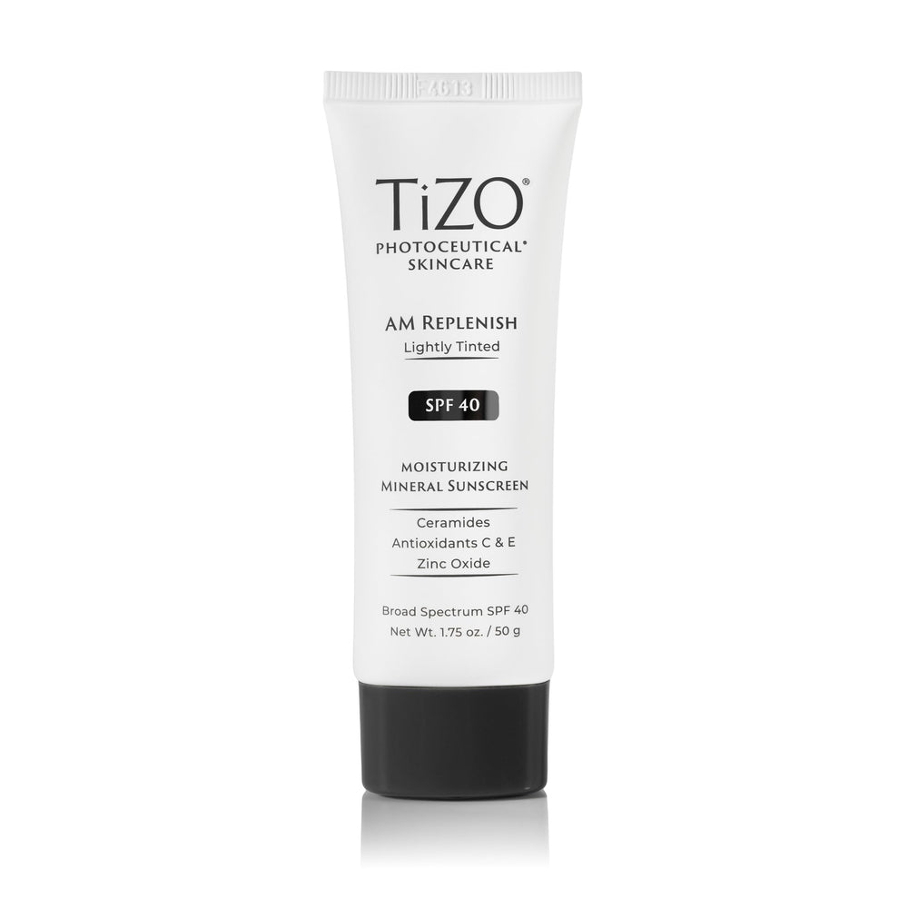 TIZO AM Replenish SPF 40 bottle closeup showing light tinted cream for daily protection