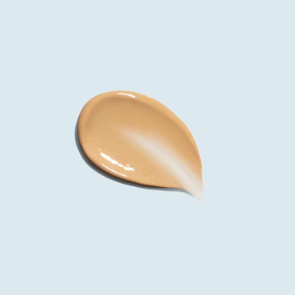 TiZO Mineral Sun Defense tinted application demonstrates a lightweight tint for daily wear.
