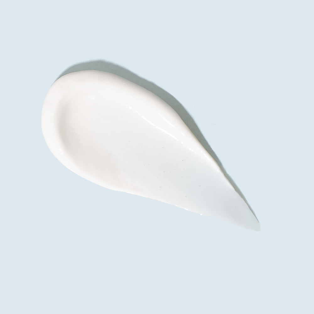 TIZO Ultra Zinc non-tinted sunscreen being applied for a sheer, dewy finish