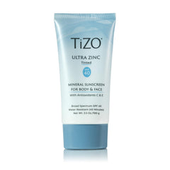 TIZO Ultra Zinc tinted sunscreen bottle closeup highlighting soothing zinc oxide.