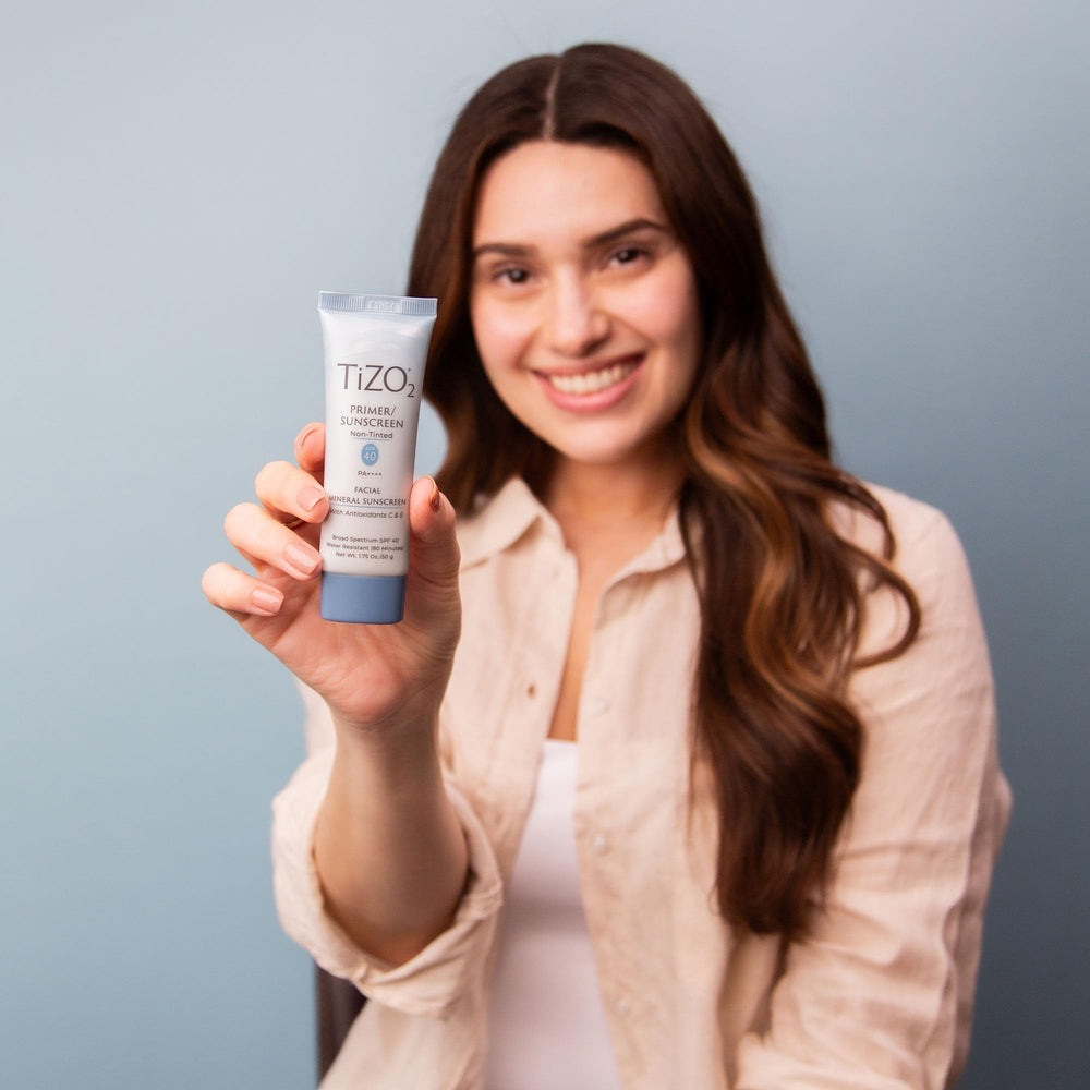 TIZO2 primer-application demonstrates versatile use beneath or over makeup