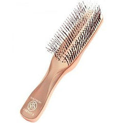 To Heart S-Heart-S Scalp Brush in use on scalp for relaxing cleansing and circulation.