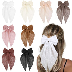 Tobeffect hair bow black 8x16 on model, adds instant polished everyday look