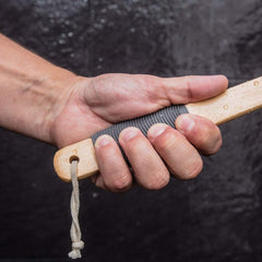 Toem lotion applicator textured-pads provide secure grip even with wet hands.