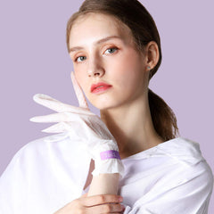 TOI:L Extra Silky Hand Mask gloves closeup suggesting hydration and gentle repair.