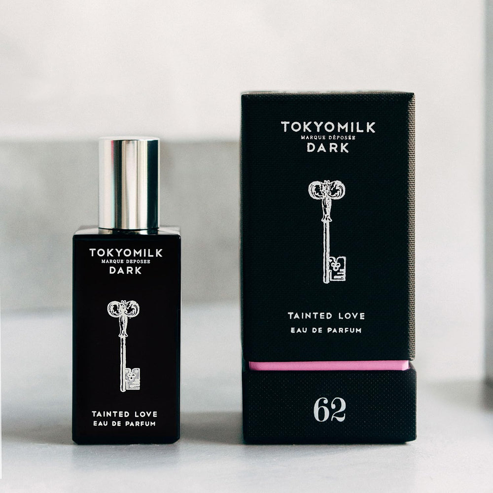 TOKYOMILK Dark Tainted Love application pulse point suggests long-lasting presence.