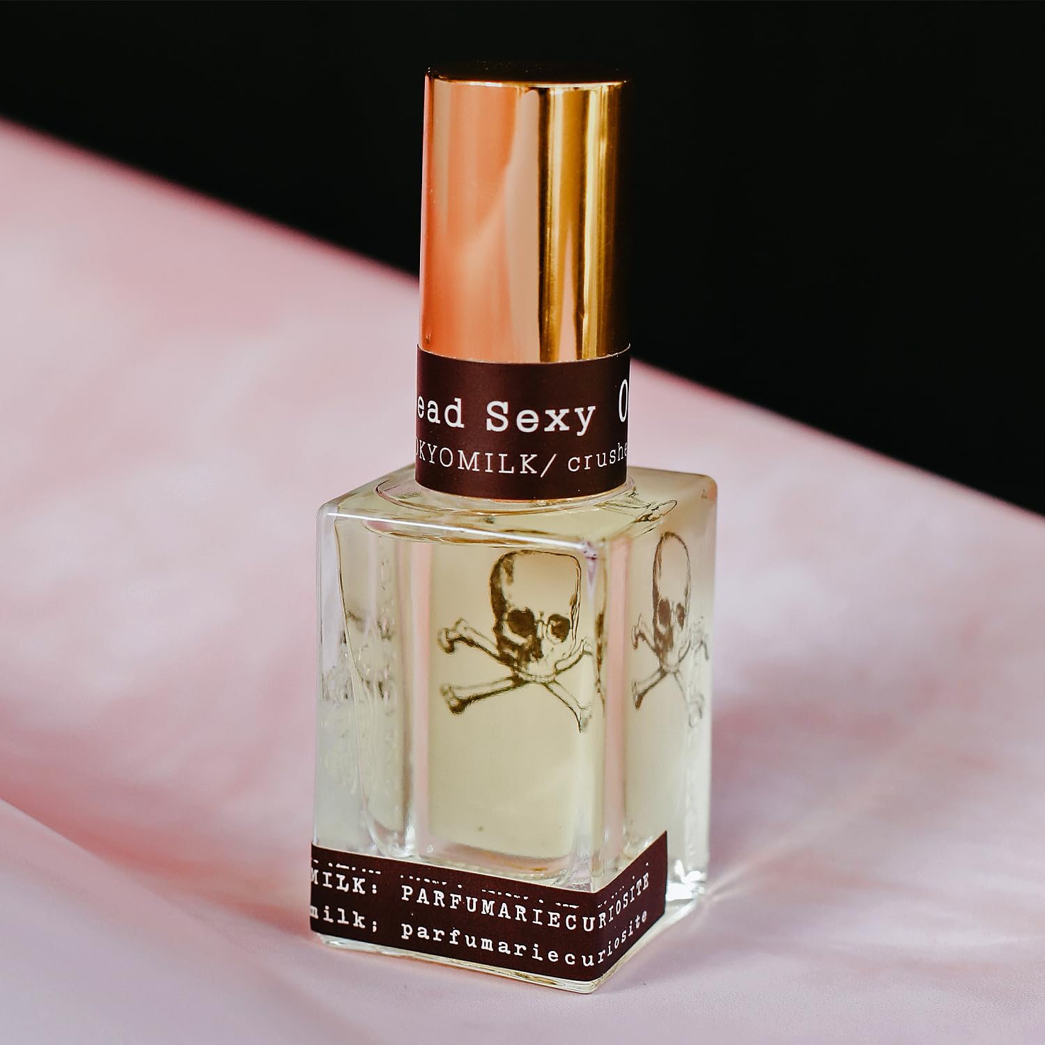 TOKYOMILK Dead Sexy notes image highlights exotic wood for confident daytime refinement.