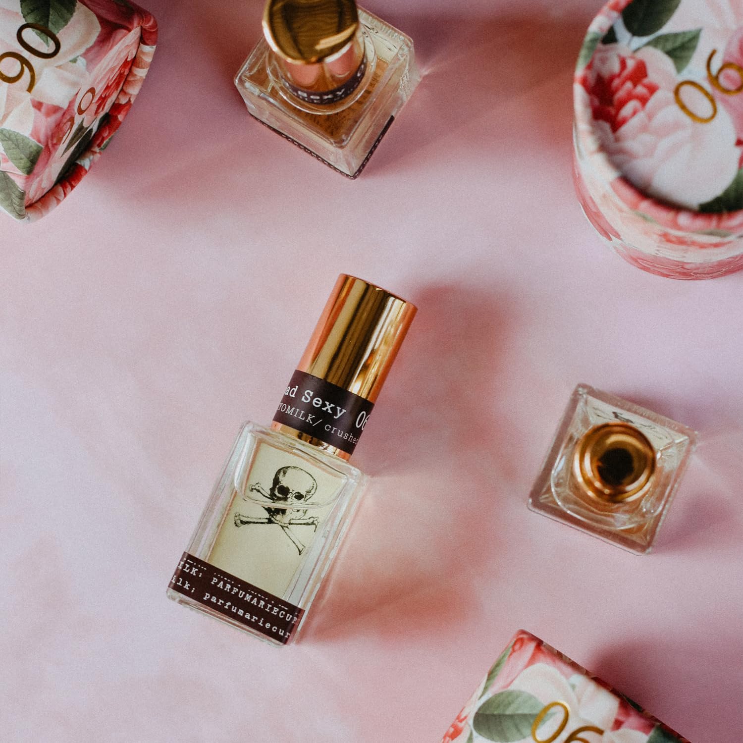 TOKYOMILK Dead Sexy orchid impact suggests luxe floral glow for date-night confidence.