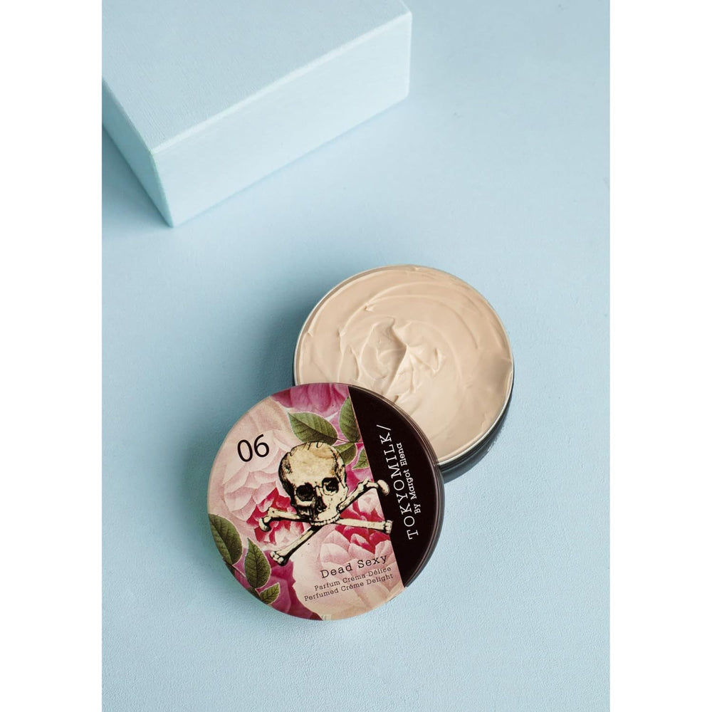 TOKYOMILK Dead Sexy Parfum Crema bottle pour reveals warm vanilla and exotic wood notes for all-day allure.