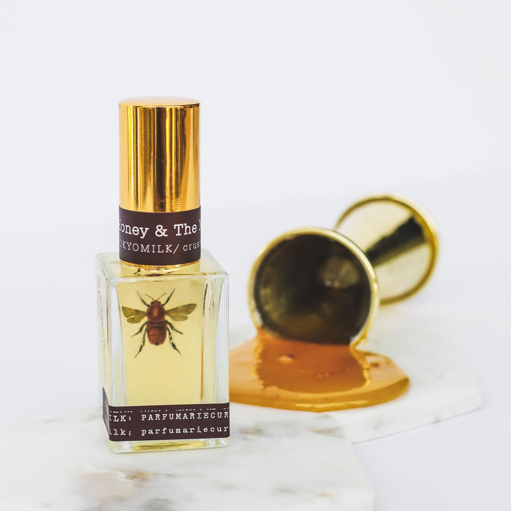 TOKYOMILK Honey & The Moon note illustration hints at honey, violet, and jasmine depth.