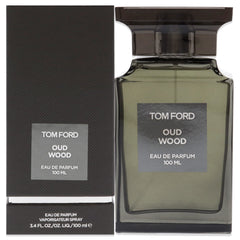 Tom Ford Oud Wood bottle-front features refined oriental woody fragrance for all occasions.