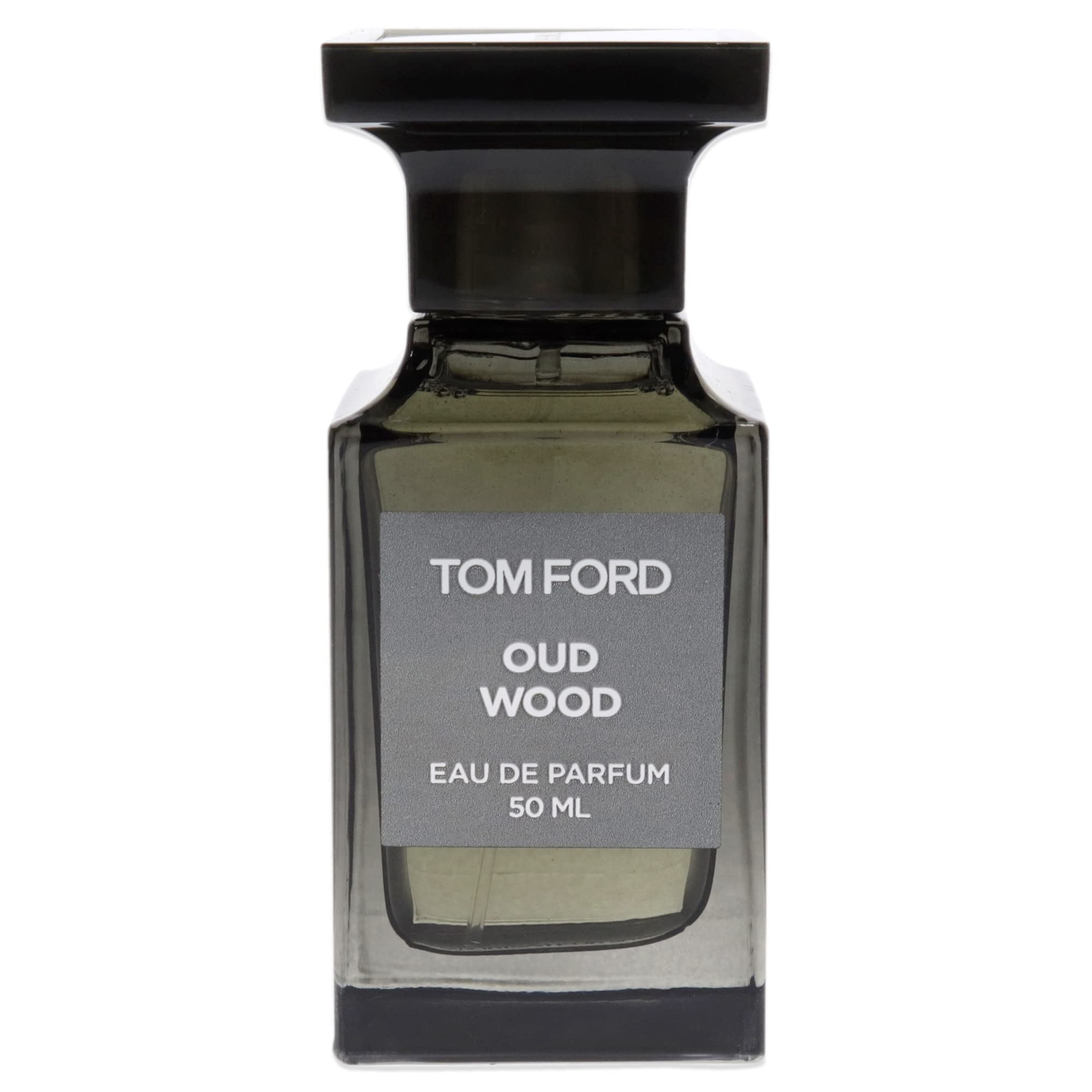 Tom Ford Oud Wood cap closeup emphasizes refined, exclusive scent experience.