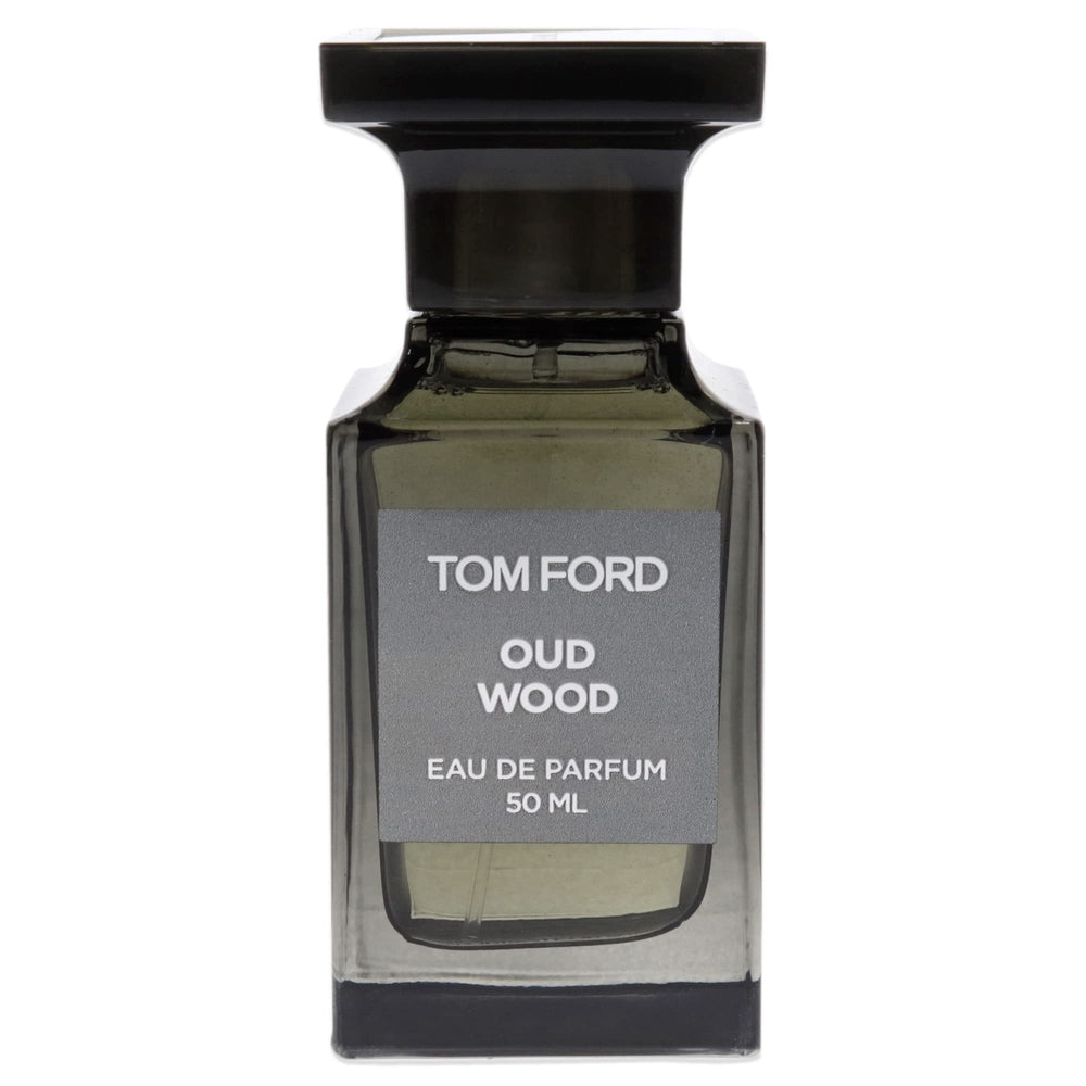 Tom Ford Oud Wood cap closeup emphasizes refined, exclusive scent experience.