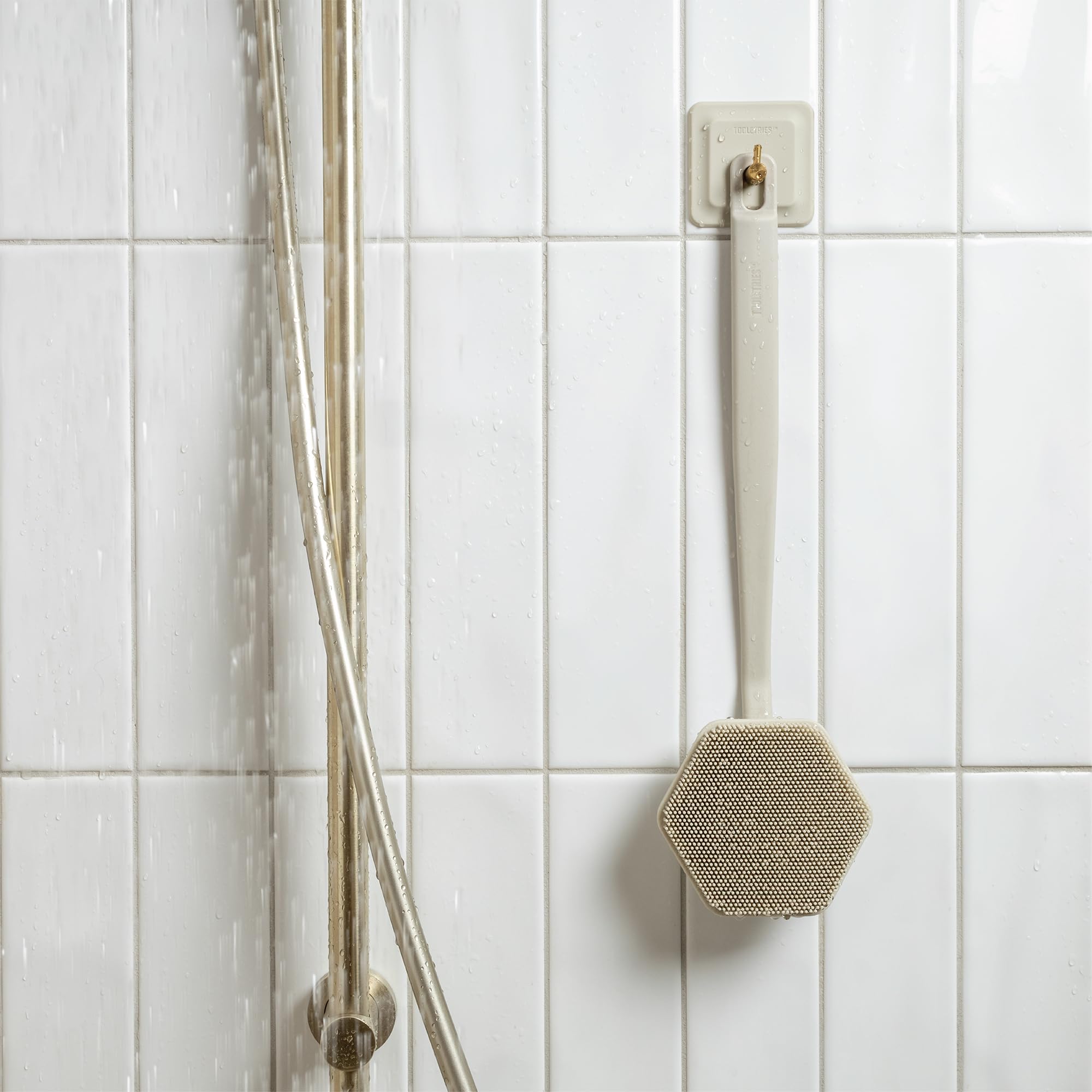 TOOLETRIES silicone back scrubber can be used on glass surfaces for easy rinse