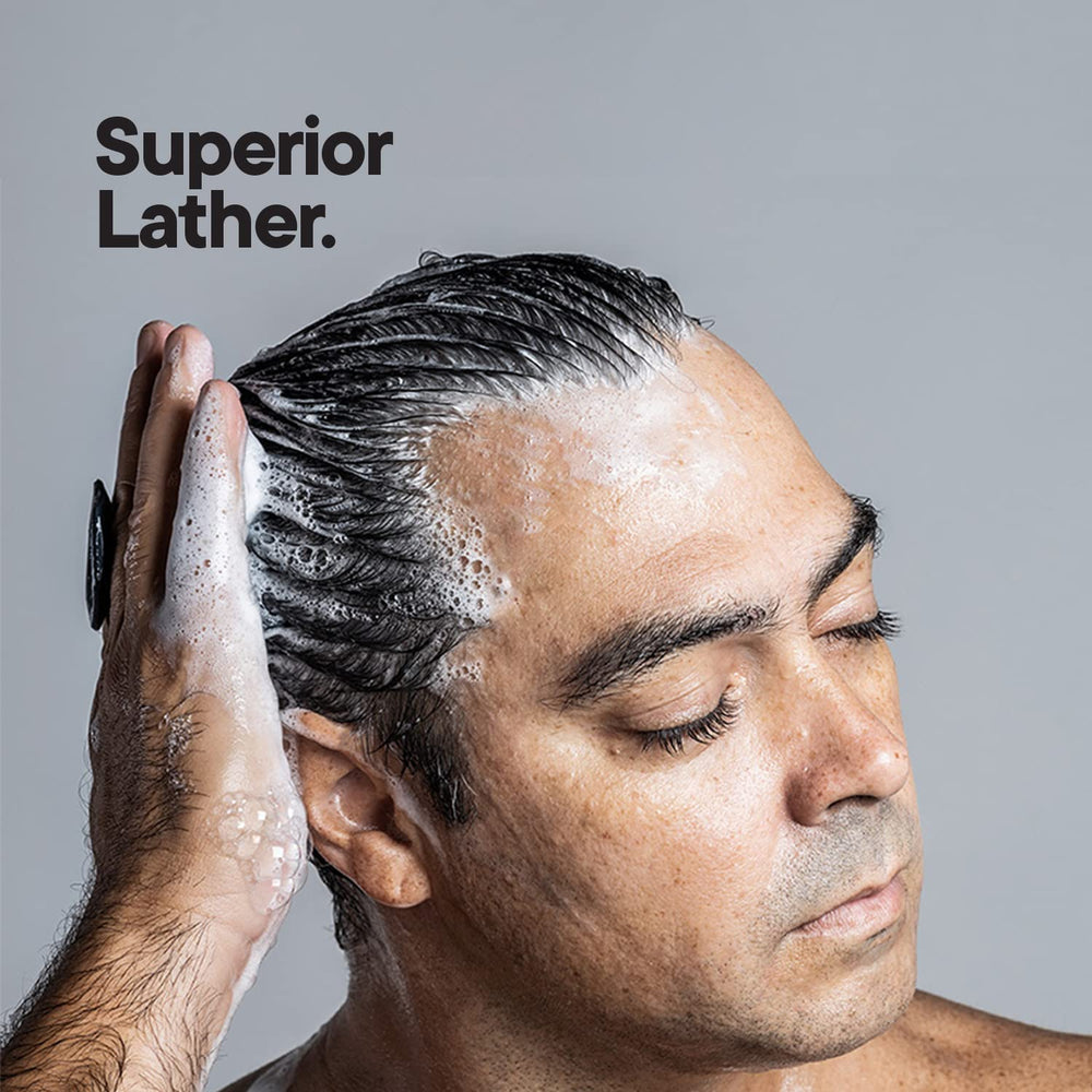 TOOLETRIES bath organizer hook keeps grooming tools within reach in the shower.