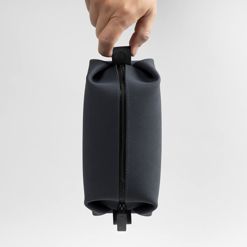 TOOLETRIES Koby Lite Dopp Kit charcoal color adds sleek style to bags.