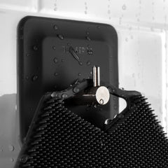 TOOLETRIES removable-hook demonstrates versatile hanging and travel-ready organization.