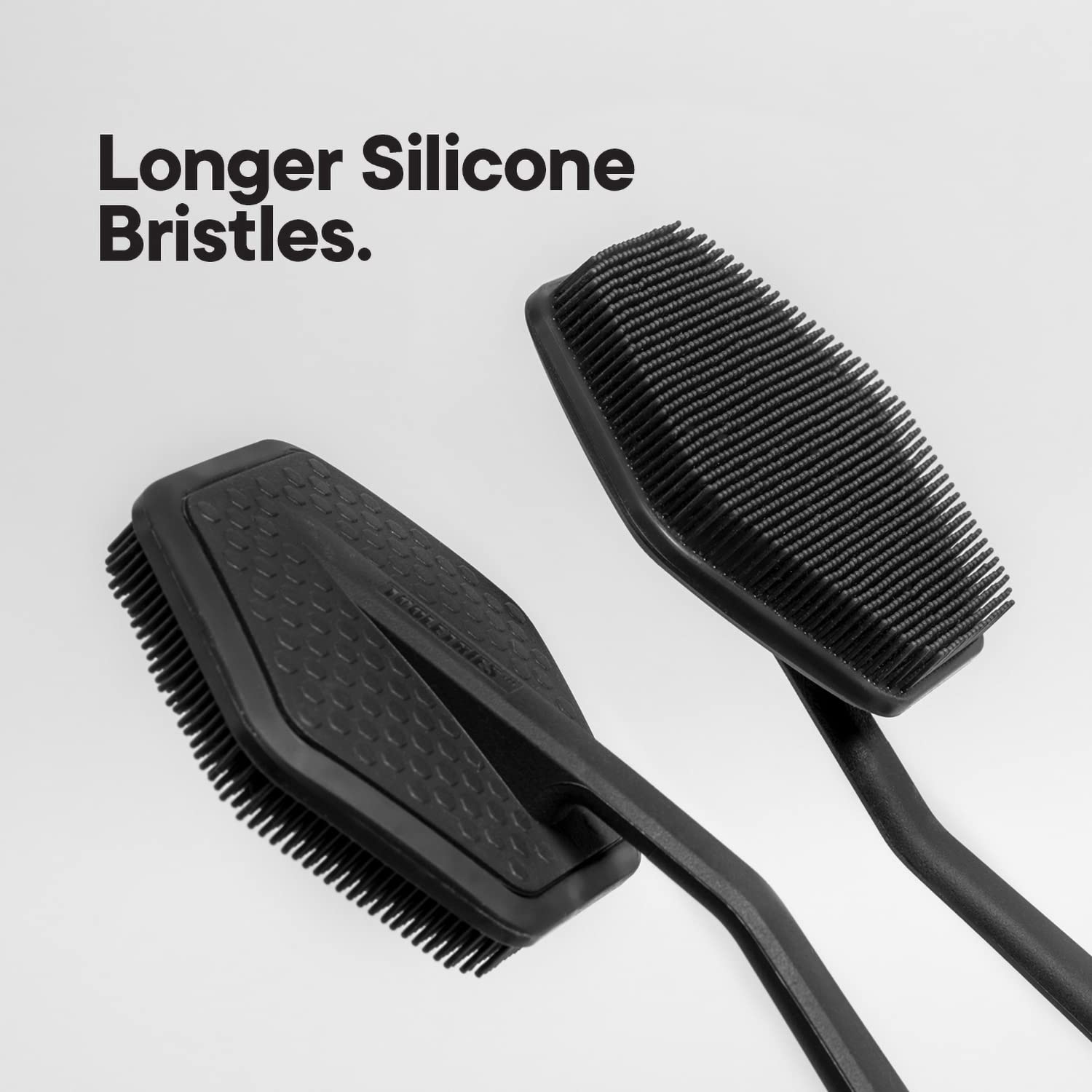 TOOLETRIES silicone back scrubber with body wash application demonstrates easy lathering and cleansing.