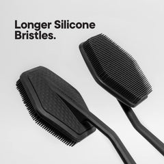TOOLETRIES silicone back scrubber with body wash application demonstrates easy lathering and cleansing.