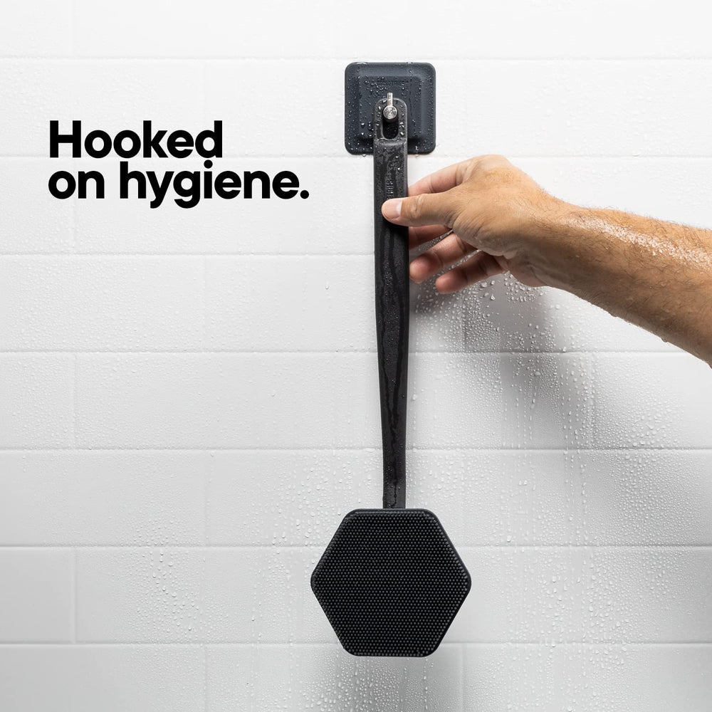 TOOLETRIES silicone-grip hook on surface image shows adhesion on smooth surfaces without adhesive
