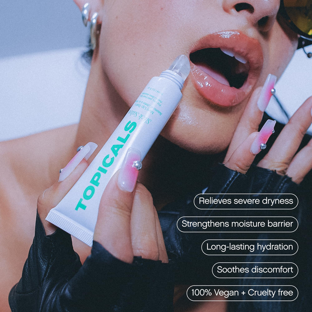 Topicals Slick Salve Mint Glossy Lip Balm application shows smooth non-greasy moisture.