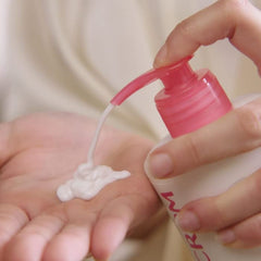 Topicrem Ultra-Moisturising Body Milk application shot demonstrates fast absorption.