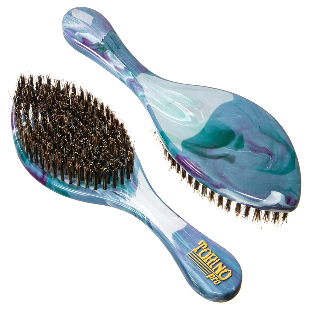 Torino Pro Curve Wave Brush curved design shows ergonomic grip for comfortable styling