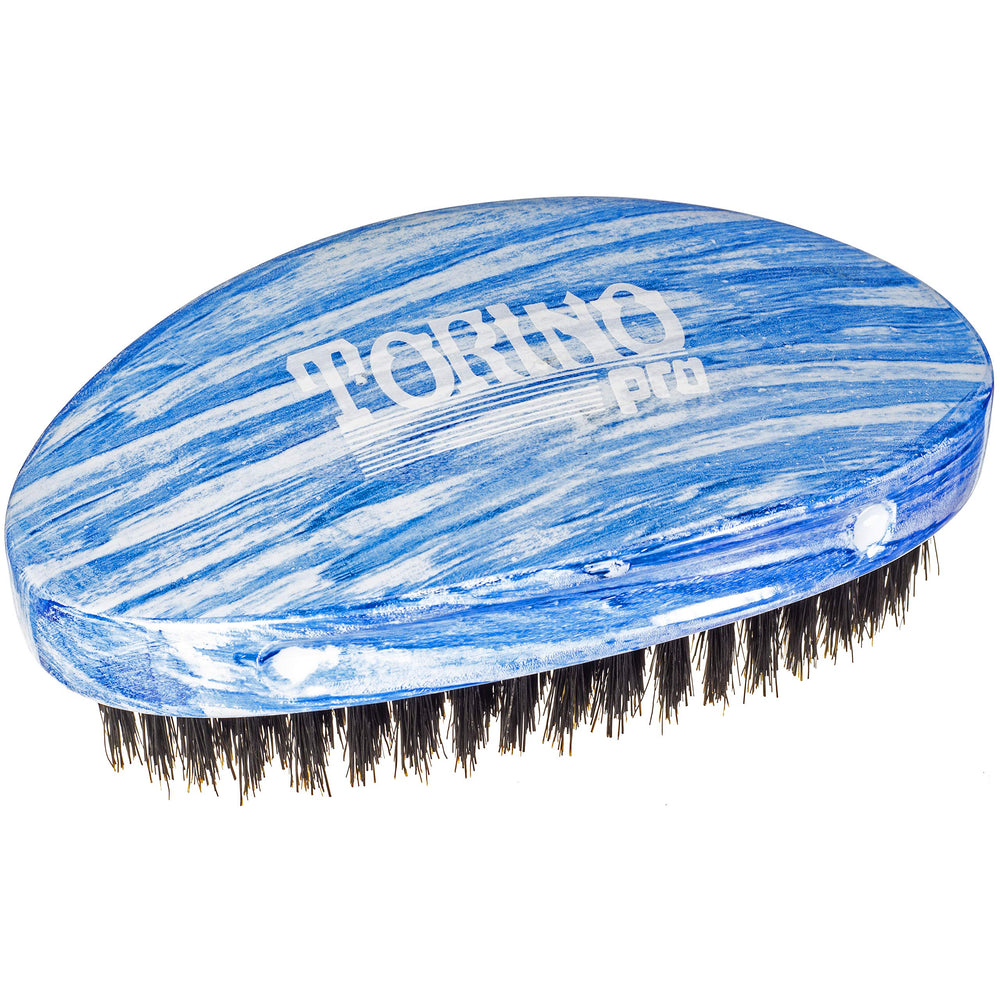 Torino Pro 19 maintenance-card included explains initial bristle shedding and care guidance