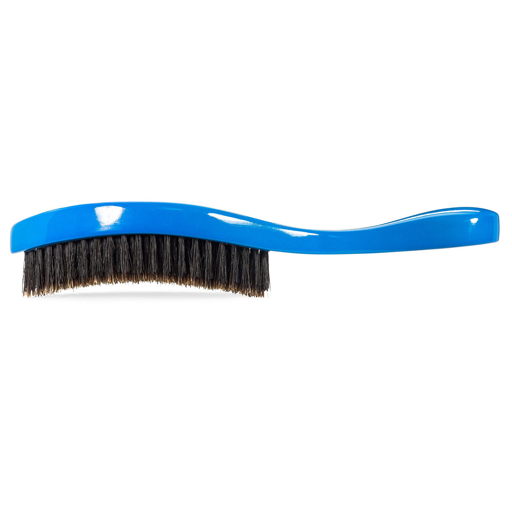 Torino Pro Wave Brush 350 blue oval curve bristle closeup shows boar bristles quality.