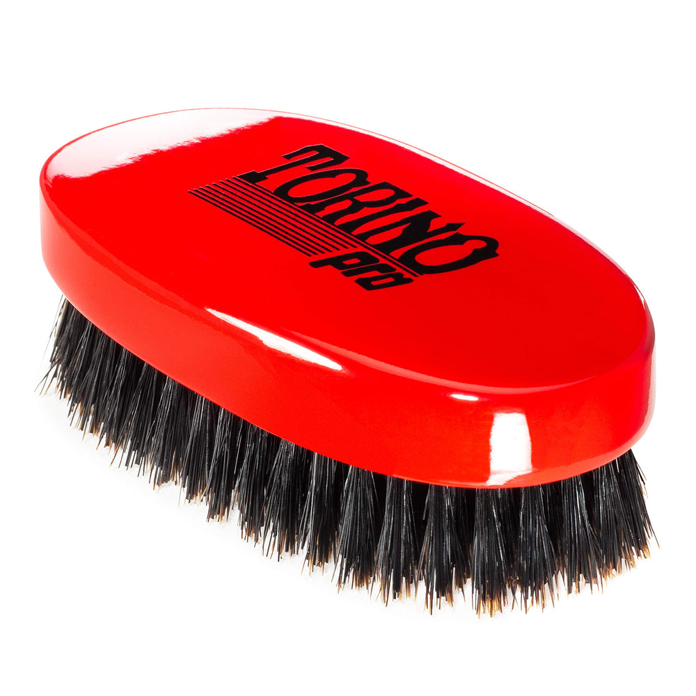 Torino Pro Wave Brush front view shows oval red grip for consistent brushing