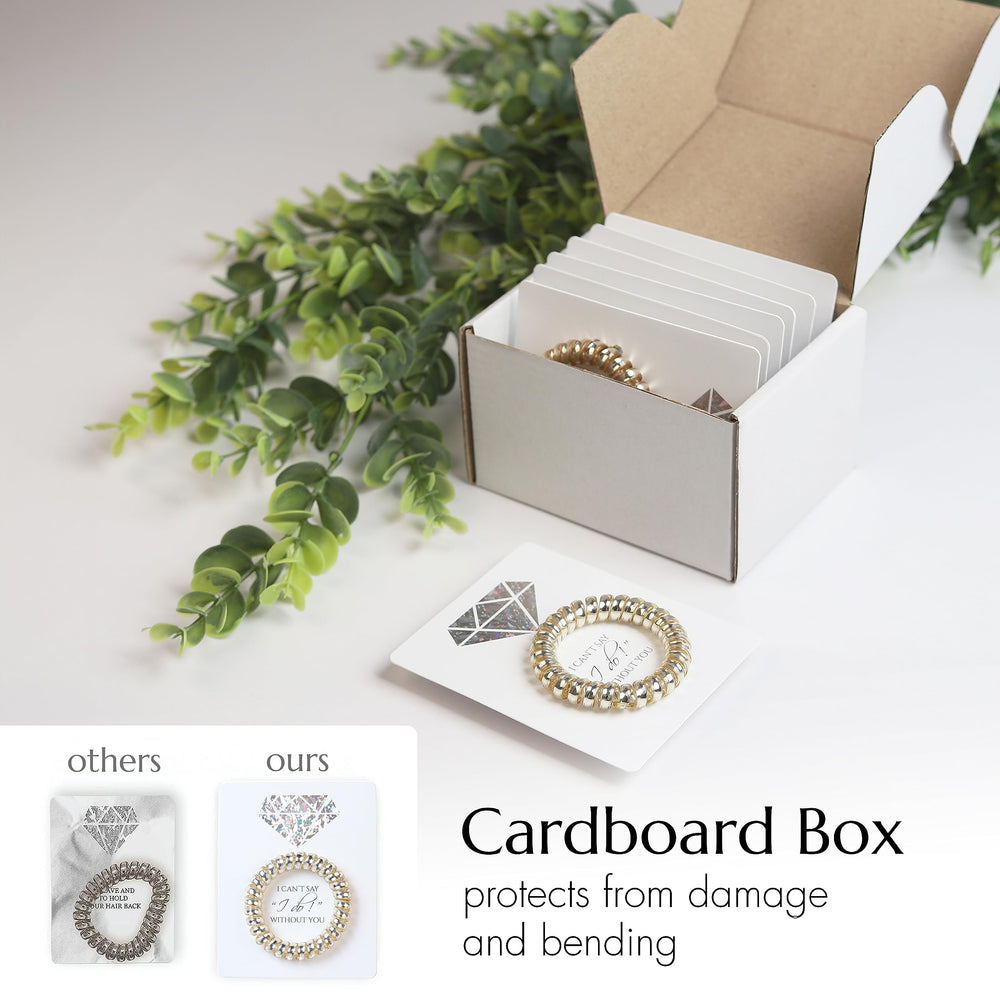 TOROS bridal shower or bachelorette favor idea featuring gold hair ties on a decorative card.