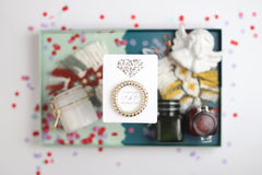 TOROS set of six silver hair ties on proposal cards for chic bridal party favors.
