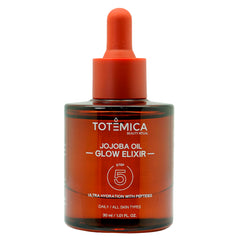 Totemica Organic Jojoba Oil Glow Elixir bottle offering quick hydration for radiant skin