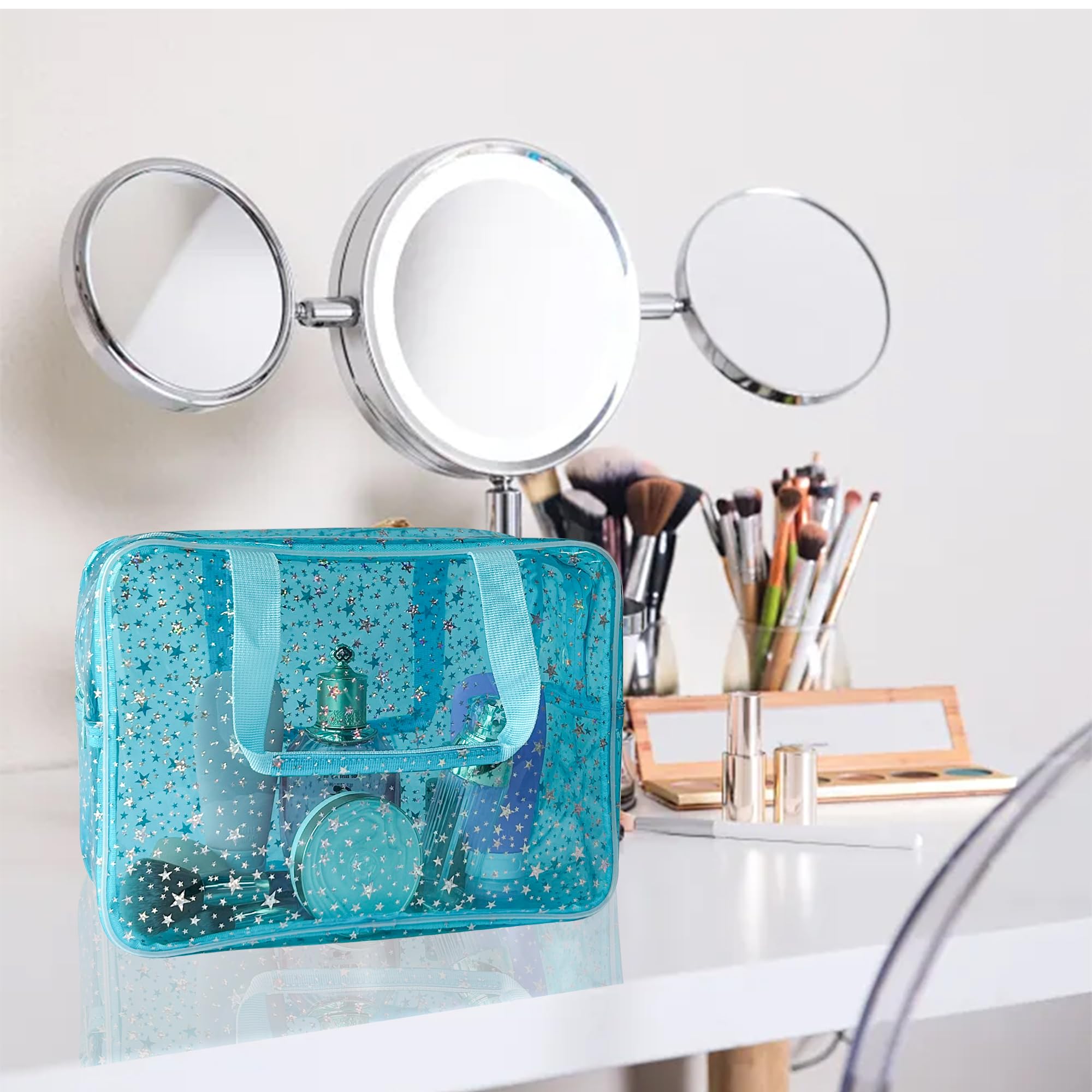 TotePrint holographic star large blue handle view emphasizes easy portability for travel.