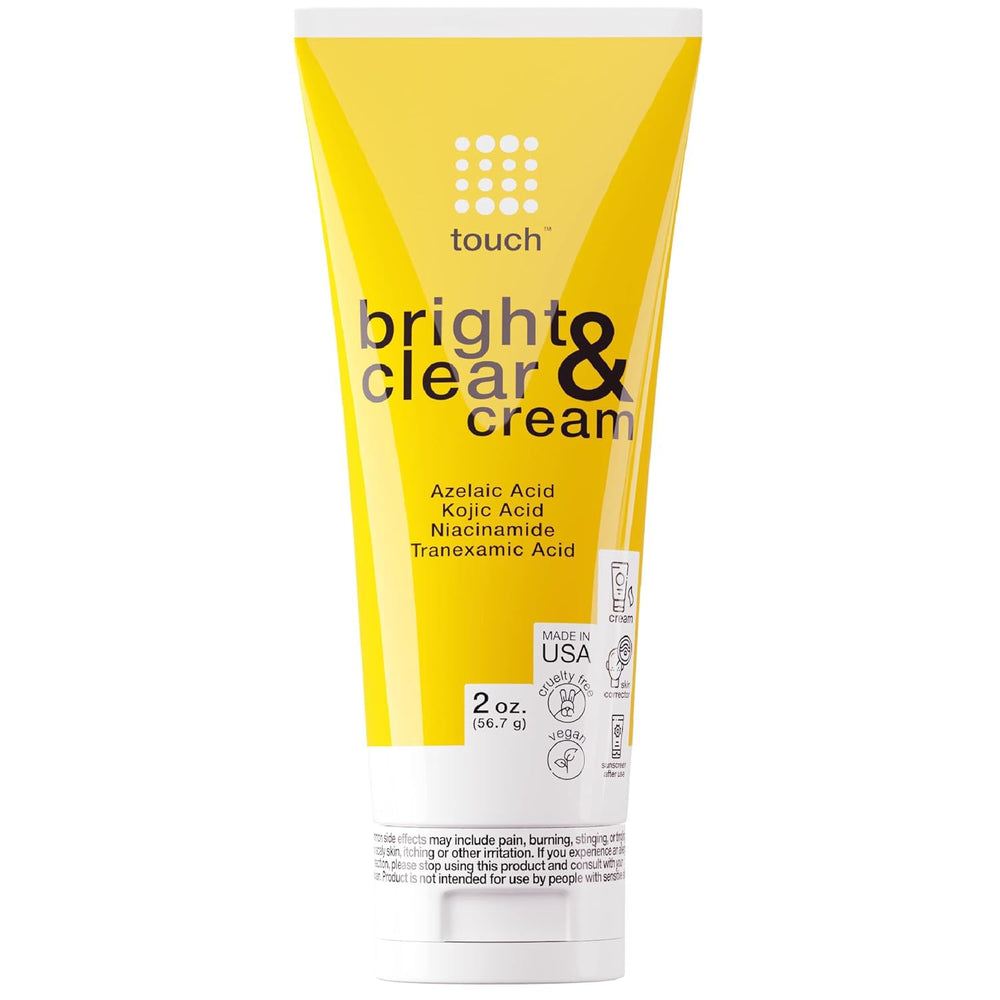 TOUCH Radiance Cream bottle closeup suggests brighter-looking skin.