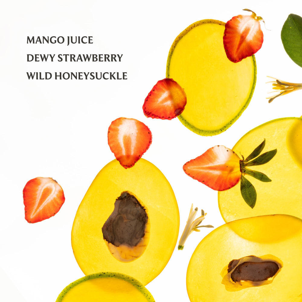 Touchland Mango Mojo mist spritzed on arm for quick refresh.