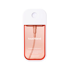 Touchland Peachy Lychee mist bottle showcases travel-friendly packaging for on-the-go freshness.