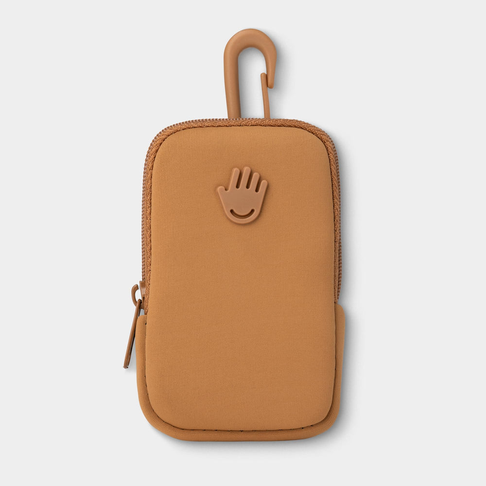 Touchland Touchette caramel pouch attached to belt loop for secure everyday carry