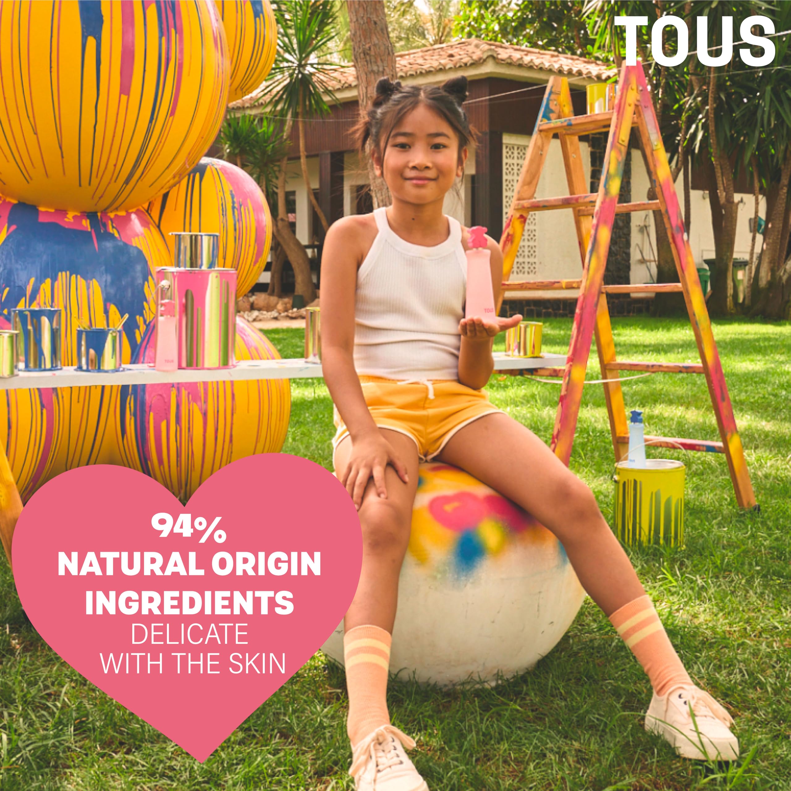 TOUS Kids Girl EDT application on wrist demonstrates easy, kid-friendly fragrance use.